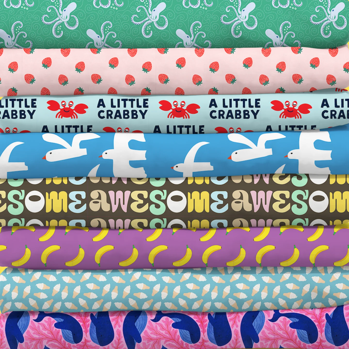 Stack of colorful kids fabrics