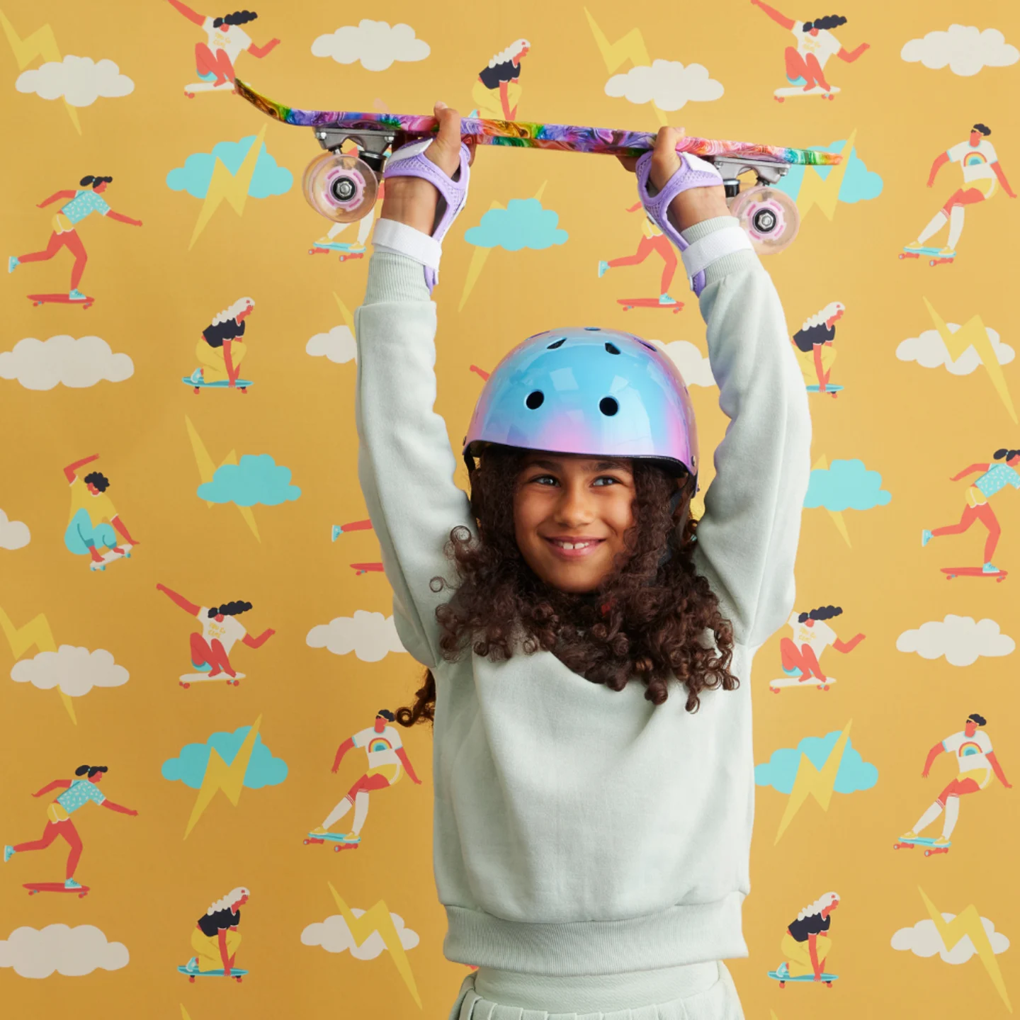 Child with skateboard themed wallpaper