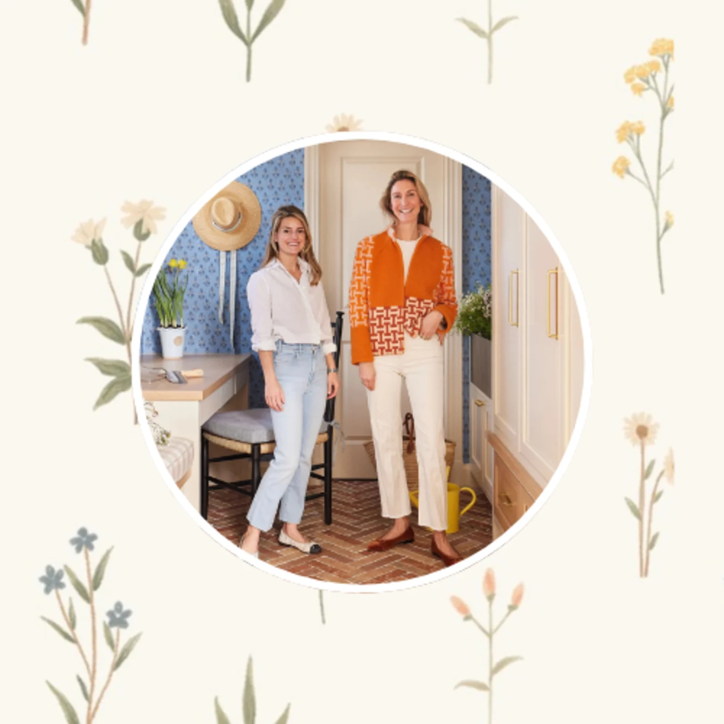 Molly Young and Jess Bauer of By Interiors in front of a small floral  design on a neutral background.